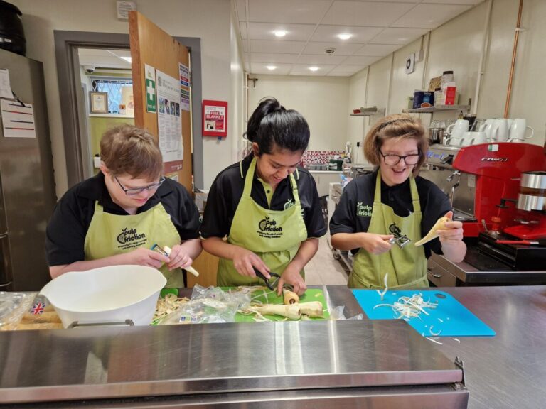 Members at the community hub - day support services featured image