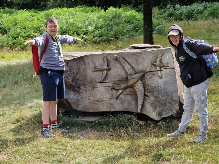 Members Albert and Beth outside having fun