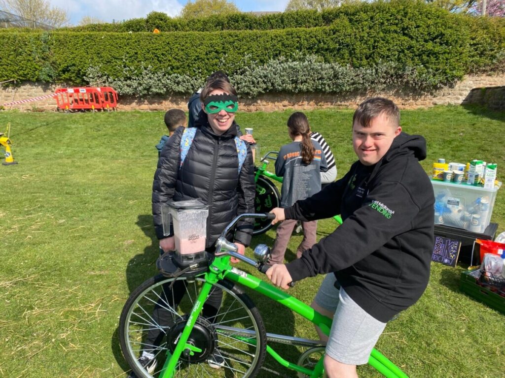 beth and albert with the smoothie bike