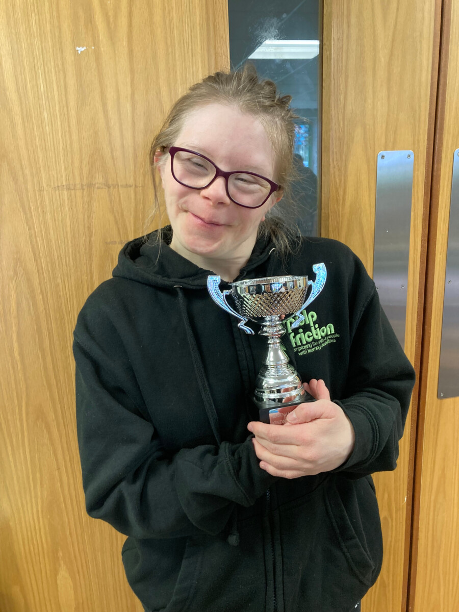PF member holding the Hannah Hogan award